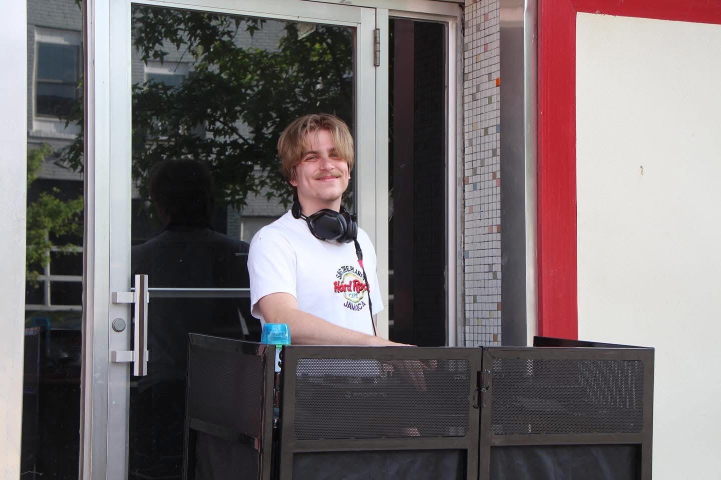 Resident DJ COOP behind his DJ booth